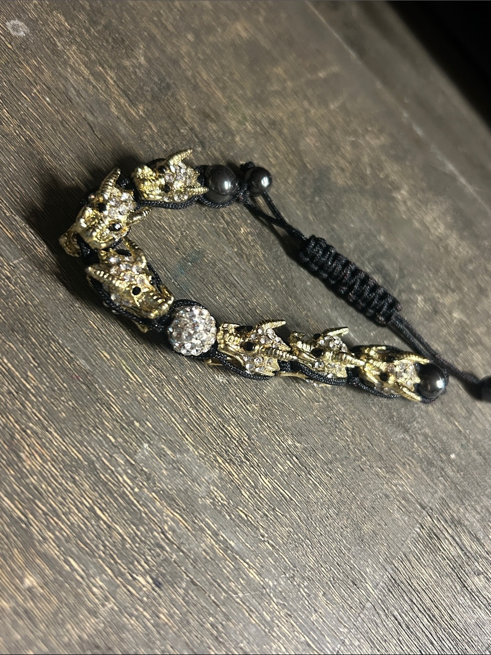 Gold Dragon Head Bead Bracelet with Black Cord